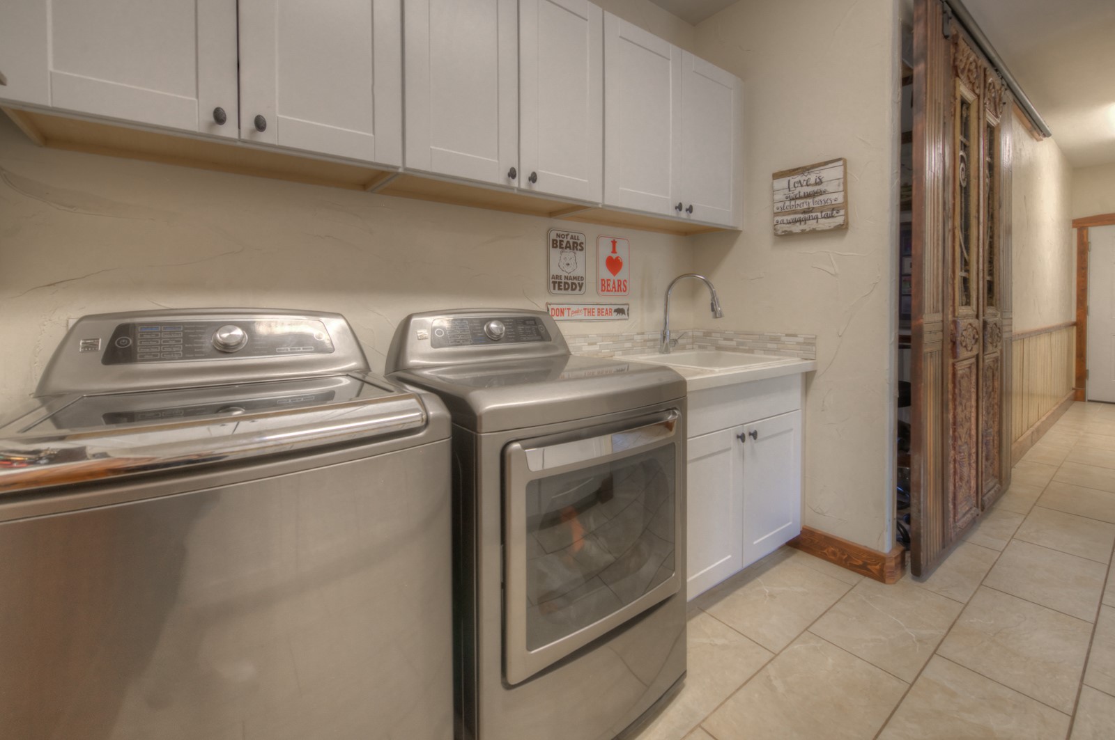 1833 Yellowstone Creek Road Walsenburg, CO 81089 - Photo 36 of 50 a utility room with dryer and washer