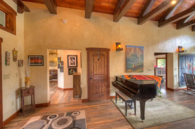 a room with furniture and wooden floor