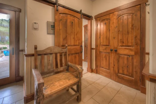 a view of wooden door and outdoor space