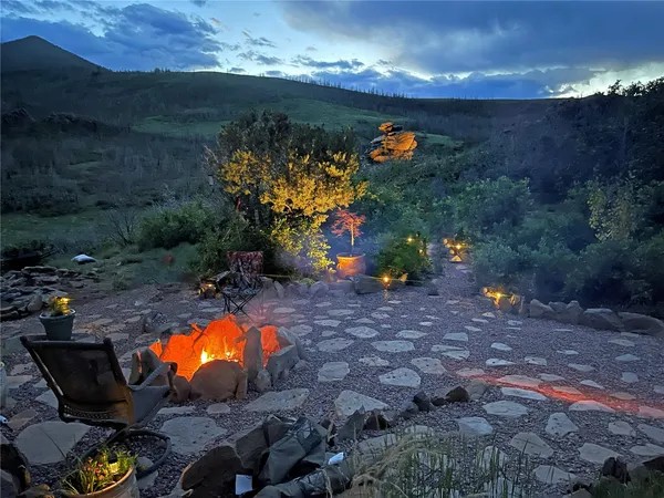 a view of swimming pool in a backyard