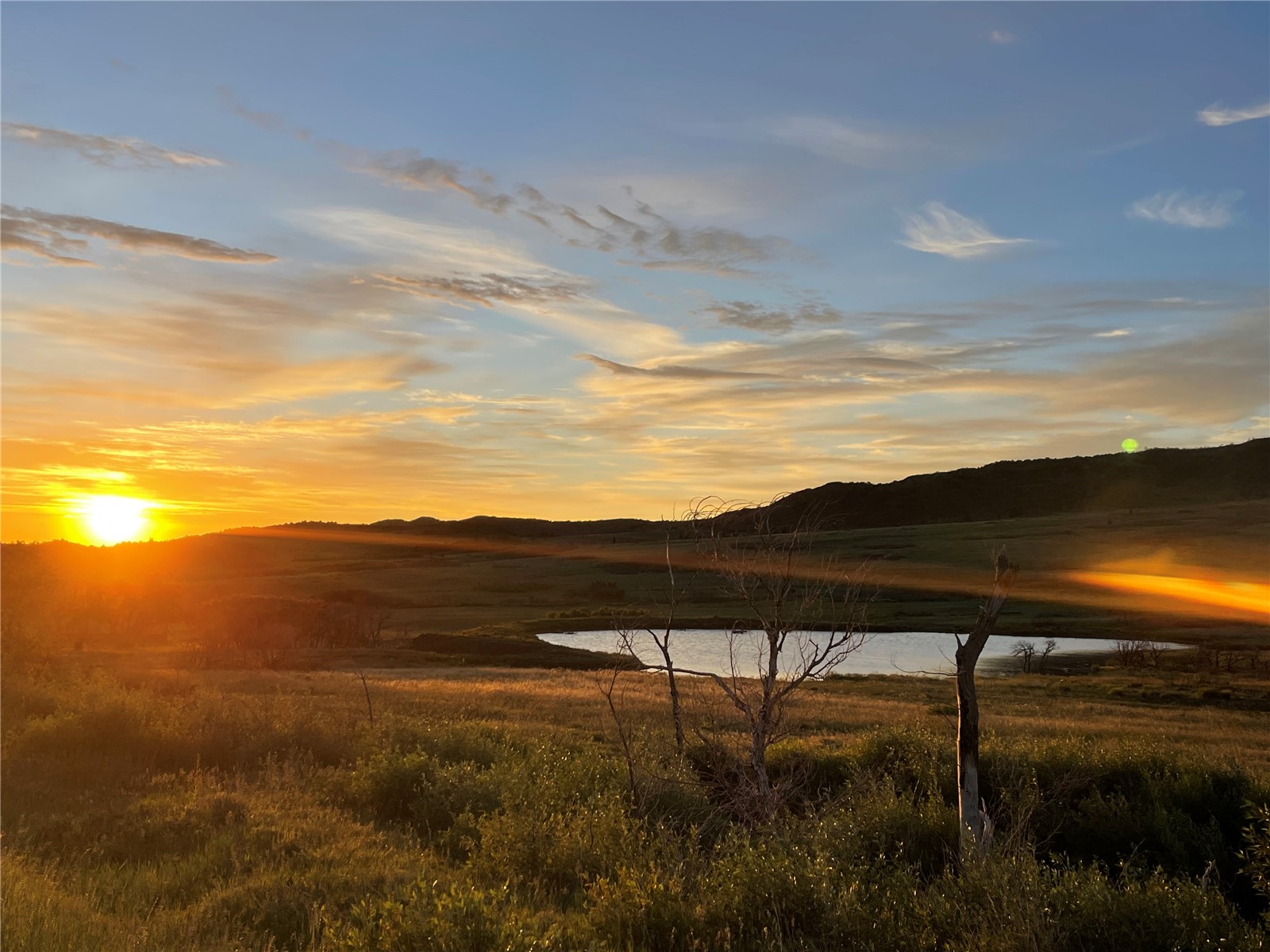 1833 Yellowstone Creek Road Walsenburg, CO 81089 - Photo 50 of 50 a view of a lake with a mountain in the background