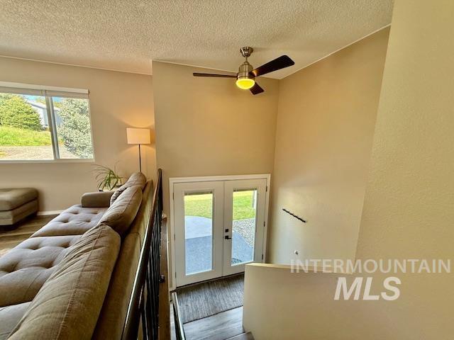 2945 25th Street Clarkston, WA 99403 - Photo 33 of 46 Entryway featuring a ceiling fan, a textured ceiling, french doors, and wood finished floors