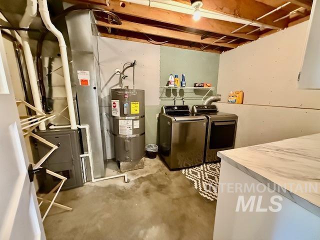 2945 25th Street Clarkston, WA 99403 - Photo 42 of 46 Unfinished basement with secured water heater and separate washer and dryer