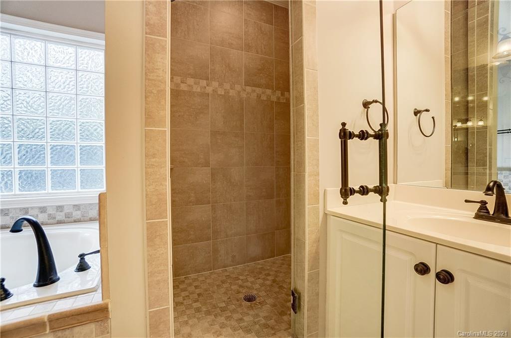 7064 Harbor Court Tega Cay, SC 29708 - Photo 27 of 48 a bathroom with a shower