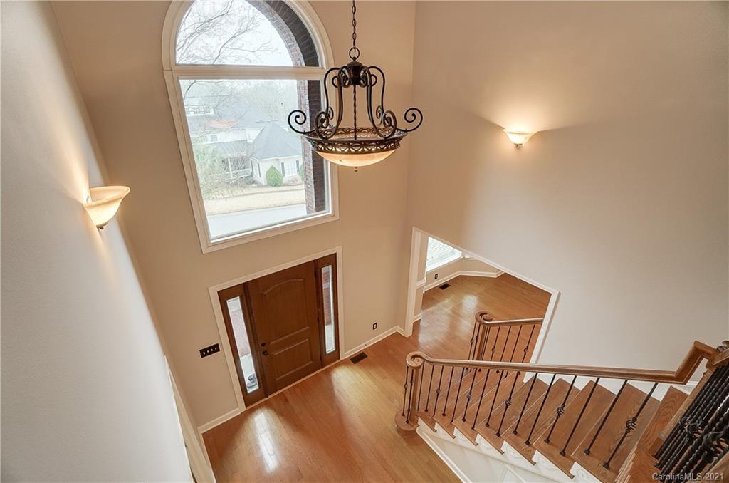 7064 Harbor Court Tega Cay, SC 29708 - Photo 30 of 48 a view of wooden floor in a livingroom