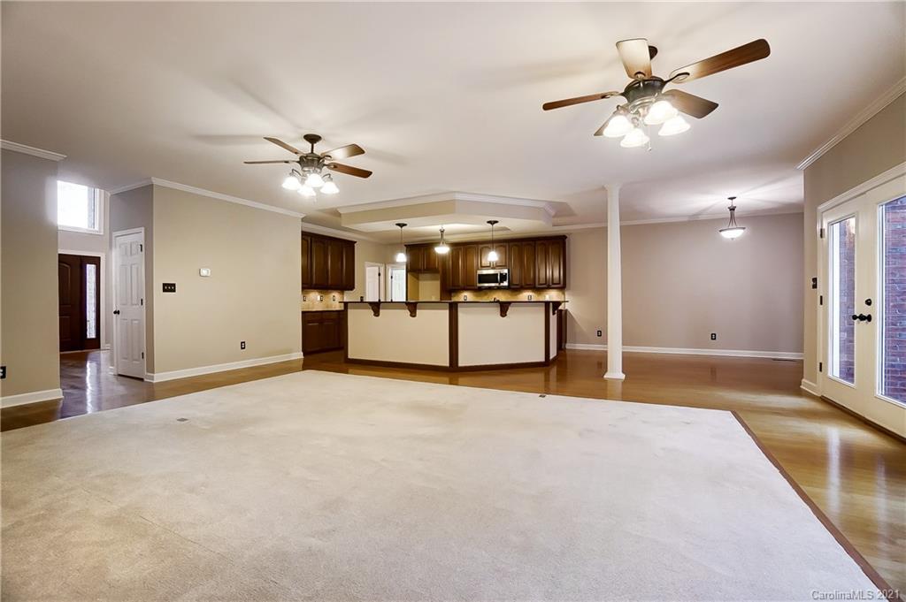 7064 Harbor Court Tega Cay, SC 29708 - Photo 8 of 48 a view of a livingroom with a ceiling fan