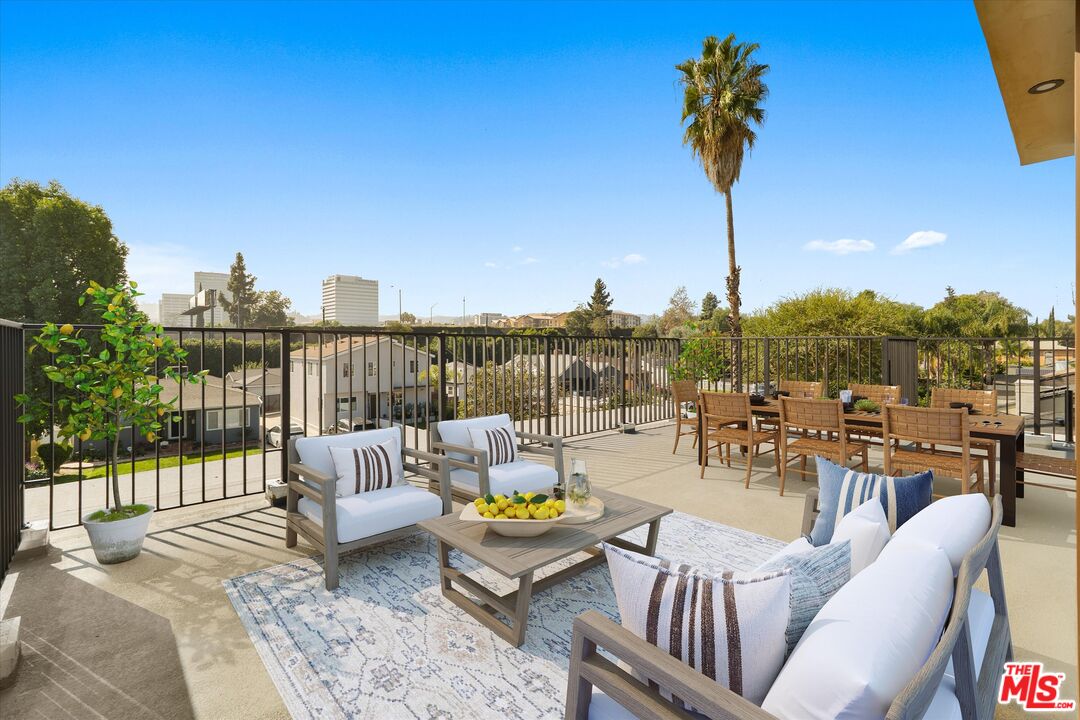 15207 Morrison Street Sherman Oaks, CA 91403 - Photo 1 of 34 a view of a terrace with furniture