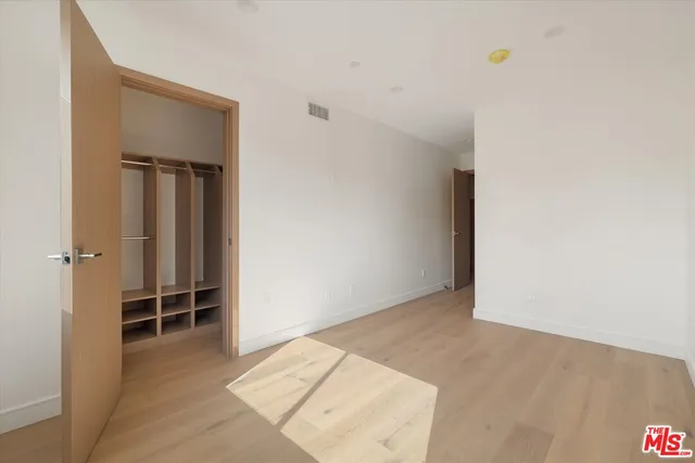 an empty room with closet