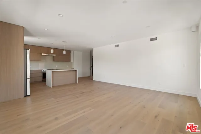 a view of a kitchen with a sink