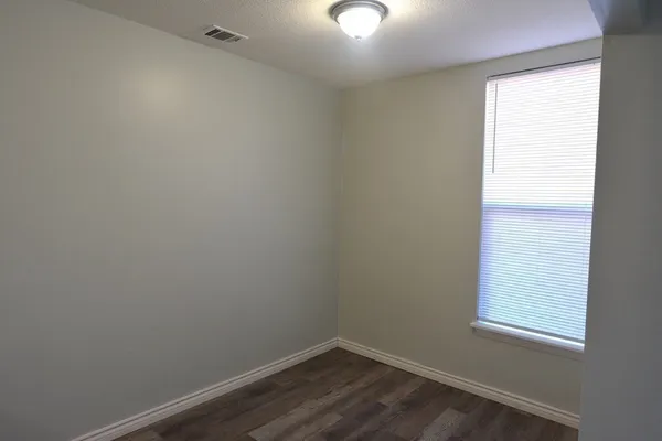 an empty room with a window