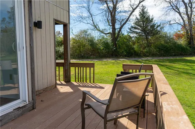 a view of a lake with a deck