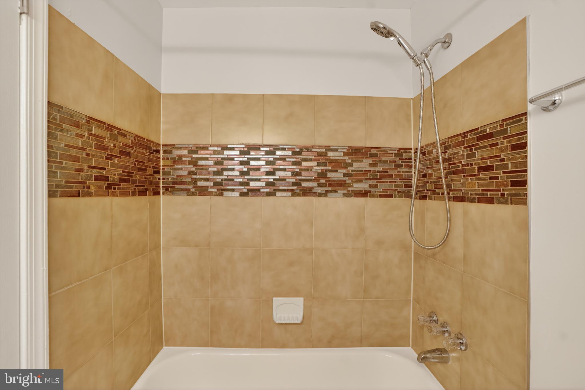1232 Palmer Road, Unit 111 Fort Washington, MD 20744 - Photo 22 of 45 a bathroom with a shower