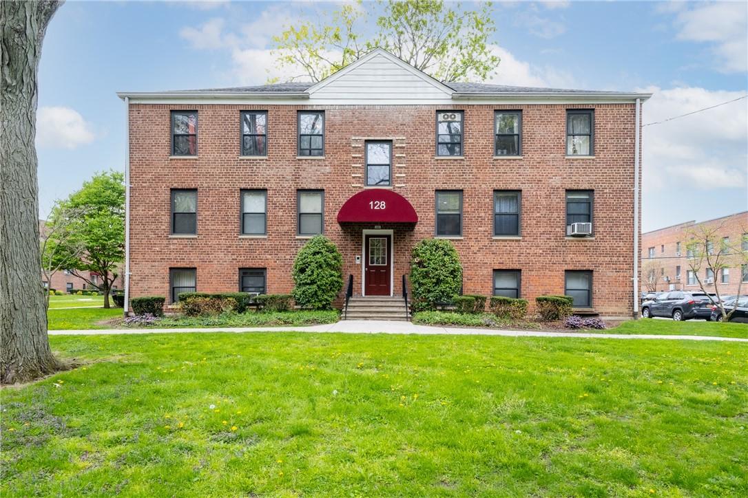 a front view of house with yard