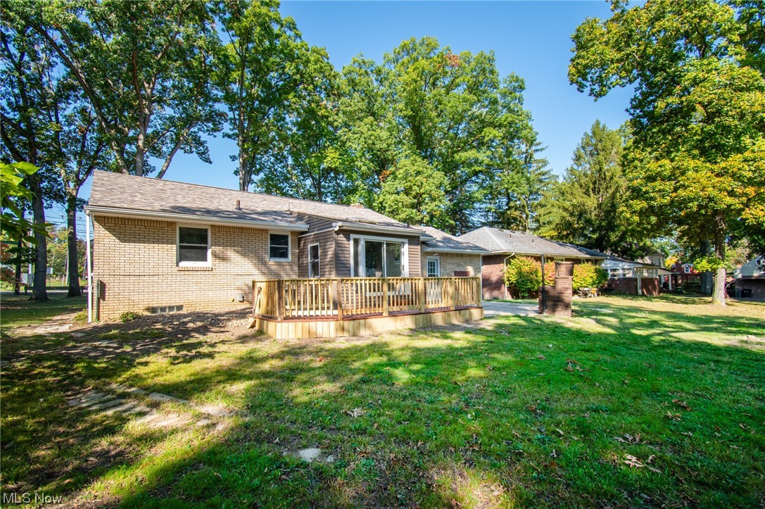 1097 South Meridian Road Youngstown, OH 44511 - Photo 27 of 29 Back of house with a wooden deck and a yard