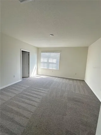 a view of empty room with window