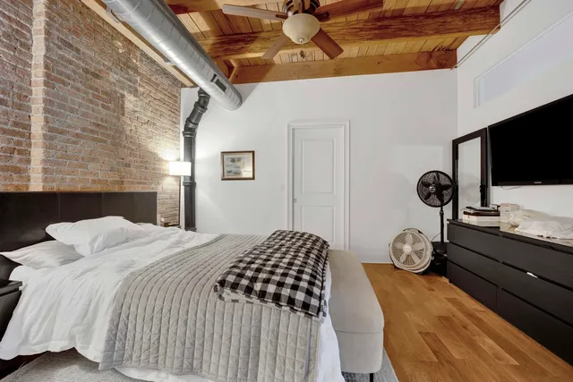 a bathroom with a tub and a shower