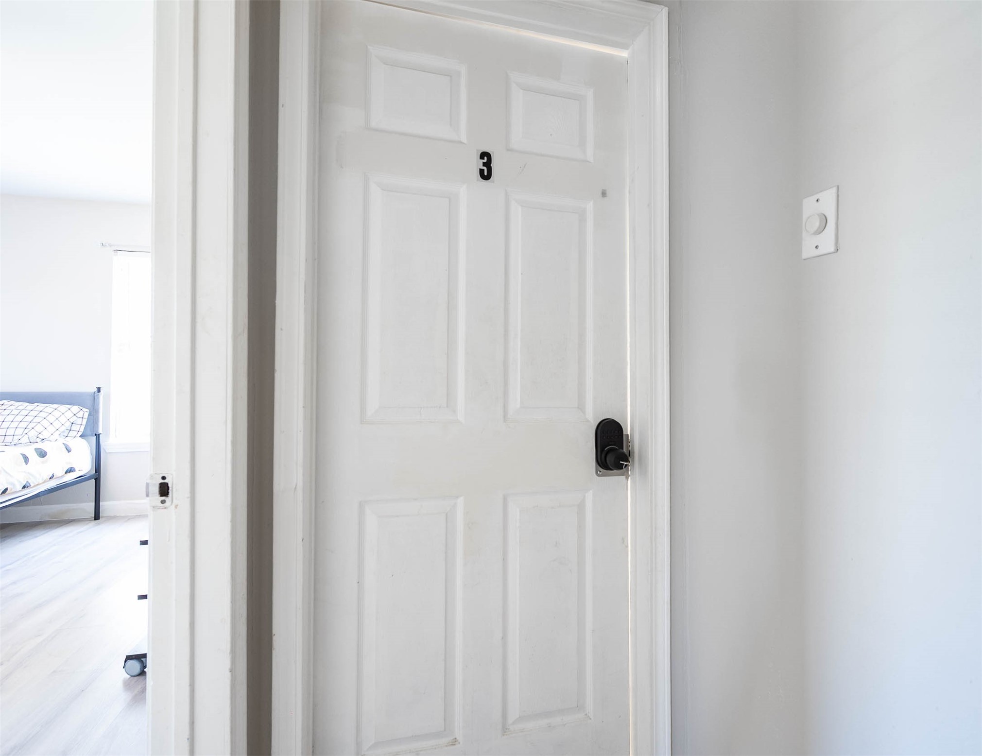3910 Luca Street, Unit R1 Houston, TX 77021 - Photo 11 of 31 a view of a hallway with wooden floor