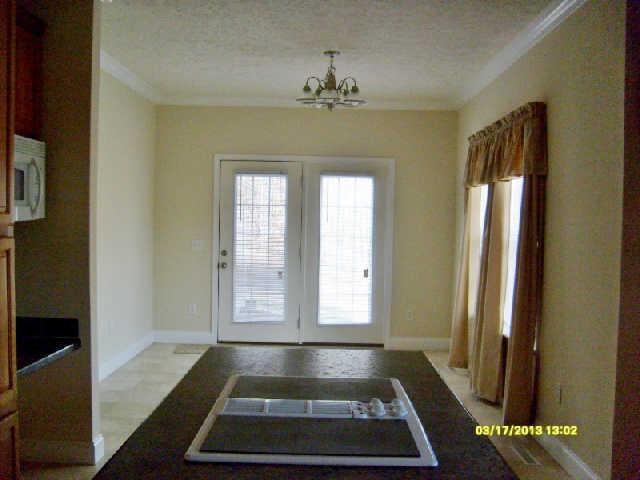 9941 Chestnut Ridge Road Lynchburg, TN 37352 - Photo 5 of 17 View from Kitchen into Dining Area