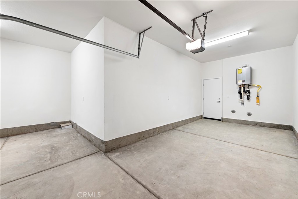214 Denali Lake Forest, CA 92630 - Photo 10 of 11 a view of a decorative ceiling fan in a room
