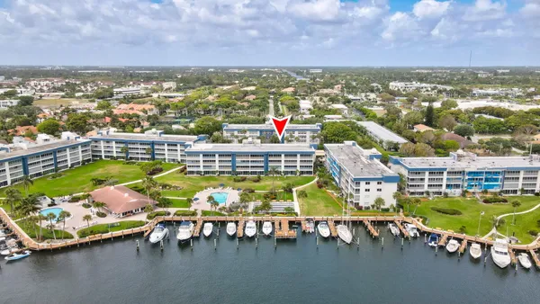 an aerial view of a swimming pool patio swimming pool and outdoor seating