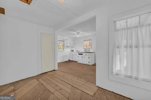 a view of an empty room and window