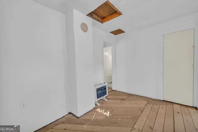 a view of small space with racks on the wall