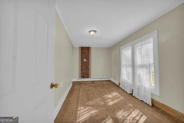 a view of a room with a window