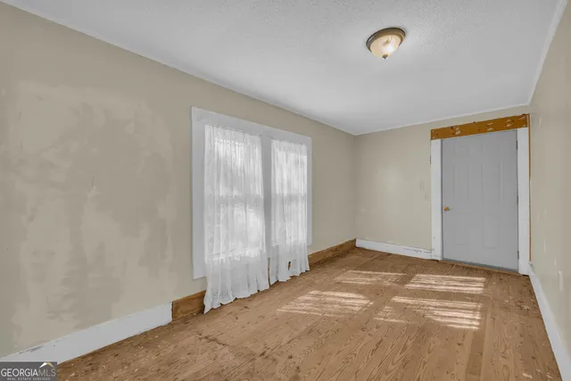 an empty room with windows