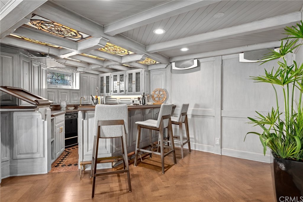 1991 Ocean Way Laguna Beach, CA 92651 - Photo 27 of 52 a dining room with furniture and a potted plant