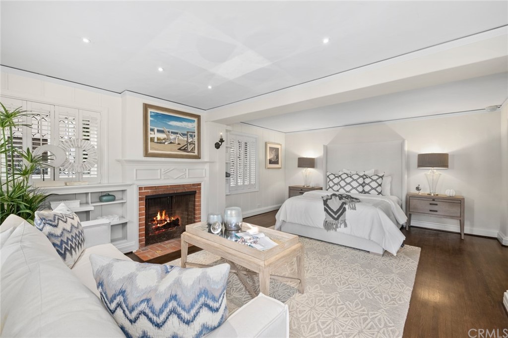 1991 Ocean Way Laguna Beach, CA 92651 - Photo 28 of 52 a living room with furniture and a fireplace