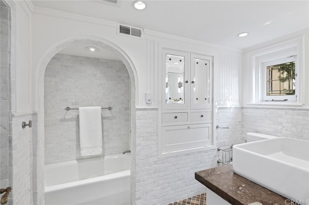 1991 Ocean Way Laguna Beach, CA 92651 - Photo 31 of 52 a bath room with a bath tub and a shower