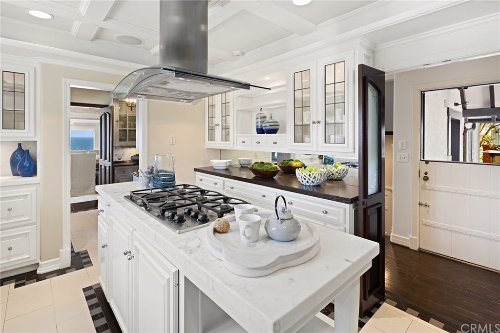 1991 Ocean Way Laguna Beach, CA 92651 - Photo 9 of 52 a kitchen with stainless steel appliances granite countertop a sink stove and cabinets