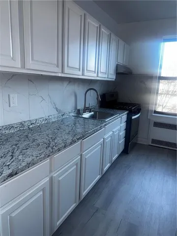 a view of a hallway with closet