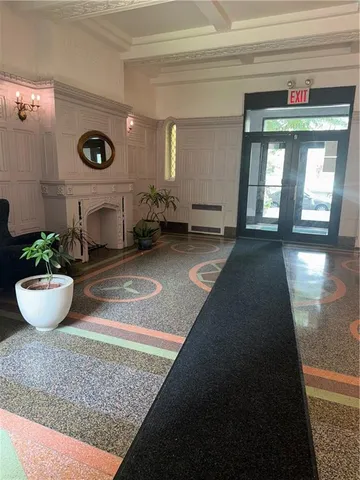 a view of entryway with a rug and a window