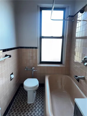 a bathroom with a sink and a bathtub