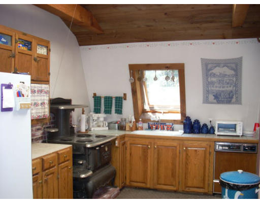 499 Ipswich Road Boxford, MA 01921 - Photo 14 of 21 a kitchen with a sink cabinets and window