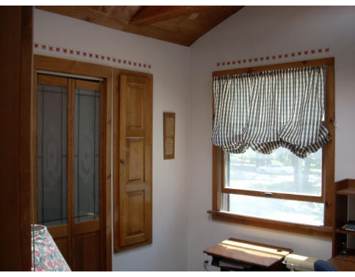 499 Ipswich Road Boxford, MA 01921 - Photo 16 of 21 a view of a closet area with a window