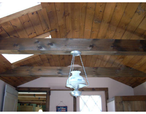 499 Ipswich Road Boxford, MA 01921 - Photo 4 of 21 a room with a chandelier