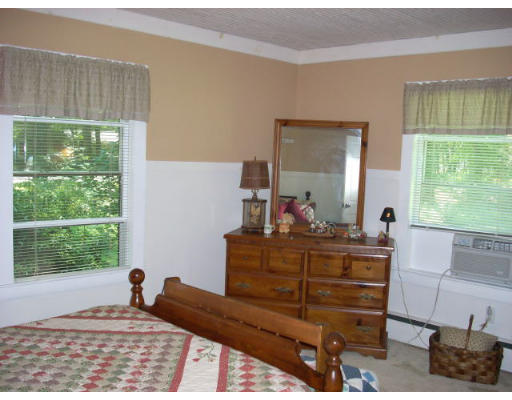 499 Ipswich Road Boxford, MA 01921 - Photo 10 of 21 a bed room with a bed and a window
