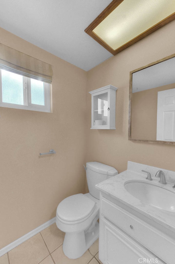 30673 Del Rey Road Temecula, CA 92591 - Photo 21 of 47 Powder Room Off Utility Room. New Sink Faucet, Bath Fixtures And Toilet Flushing Mechanism. Easy Care Tiled Flooring.