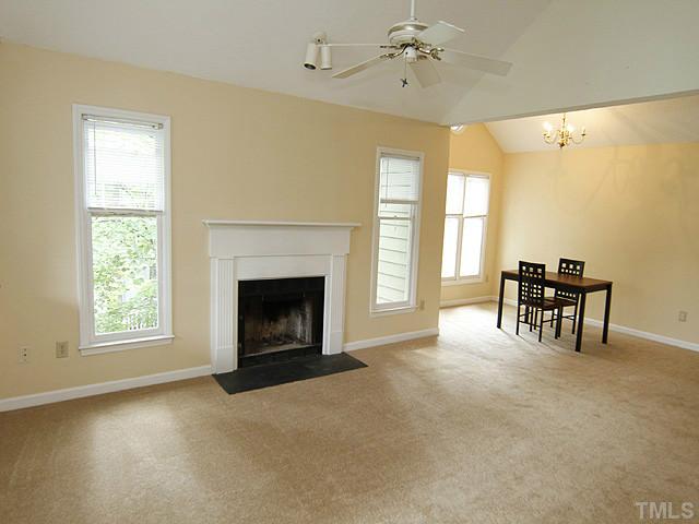 532 Springfork Drive Cary, NC 27513 - Photo 13 of 13 Another view of the living room as well as the dining room. The floor plan is perfect for anyone looking for a more open feel.