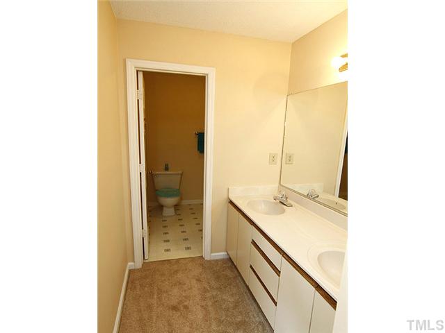 532 Springfork Drive Cary, NC 27513 - Photo 7 of 13 Great master bathroom with double vanity. The toilet and shower are seperated by a door, allowing much more space for two!