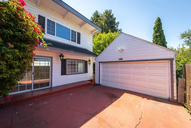 a view of a house with a garage
