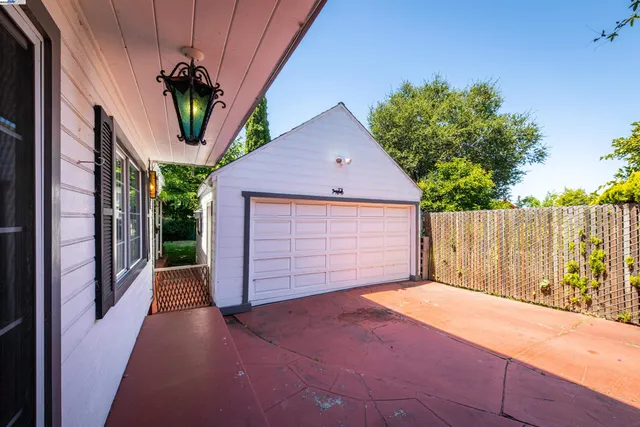 a front view of a house with a garage