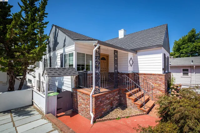 a front view of a house with glass windows