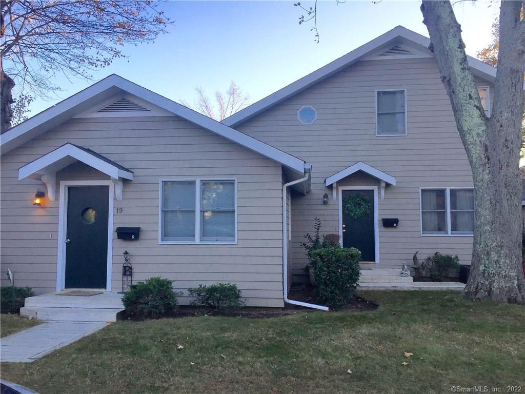 19 Rippowam Road Stamford, CT 06902 - Photo 1 of 1 a front view of a house with a yard