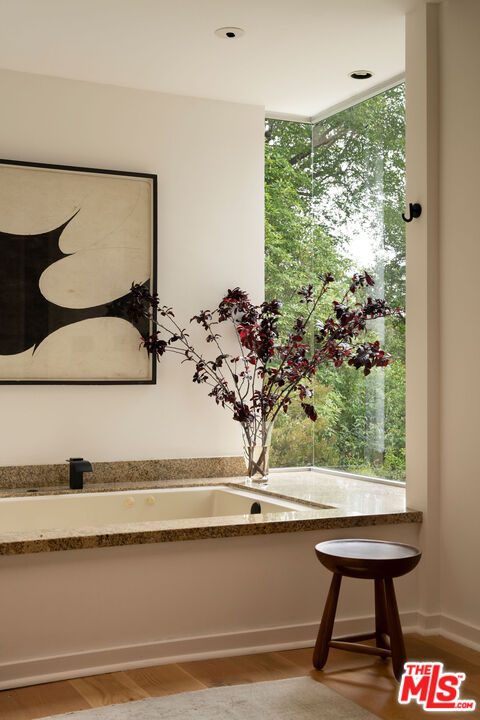 7330 Pyramid Drive Los Angeles, CA 90068 - Photo 16 of 28 a view of a balcony with chair and a potted plant