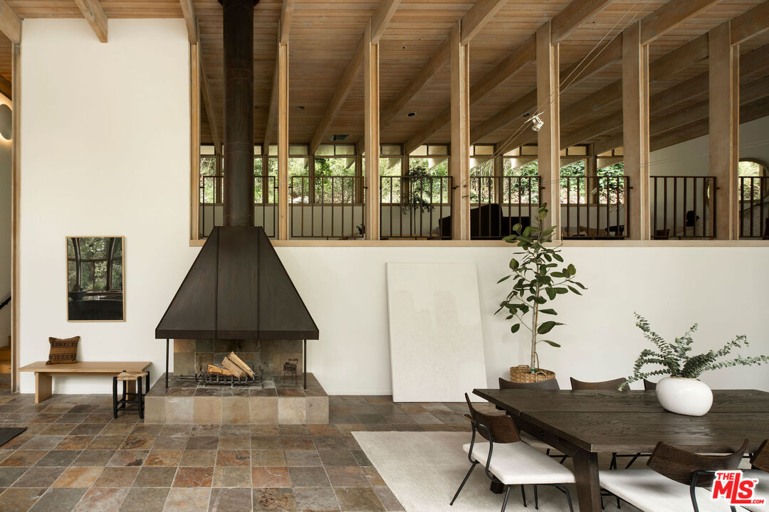 7330 Pyramid Drive Los Angeles, CA 90068 - Photo 19 of 28 a living room with furniture and a table