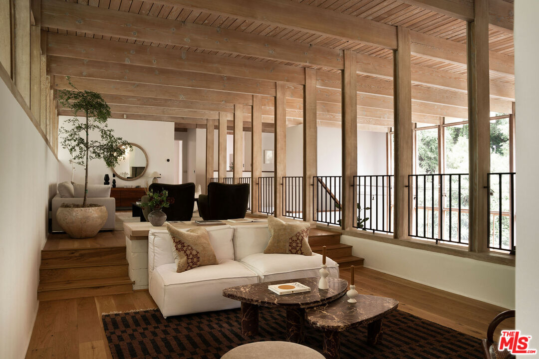 7330 Pyramid Drive Los Angeles, CA 90068 - Photo 6 of 28 a living room with furniture and a large window