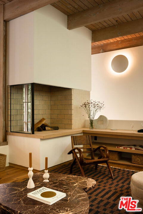 7330 Pyramid Drive Los Angeles, CA 90068 - Photo 7 of 28 a table with a granite counter top and chairs